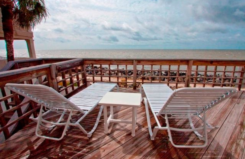 Relax by the beach at Real Escapes Properties.