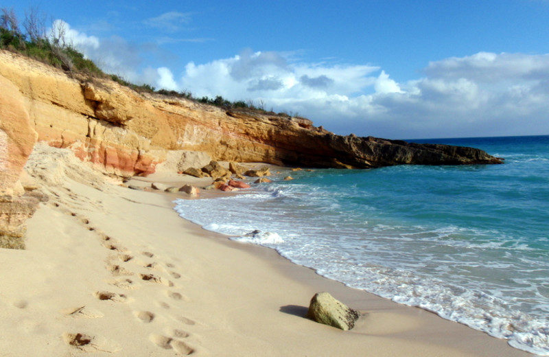 The beach at Island Properties Luxury Rentals.