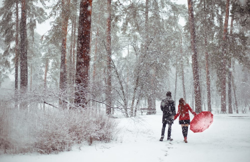 Couple in snow at Superior Shores Resort.