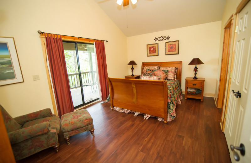 Cabin bedroom at Kiamichi Country Cabins.