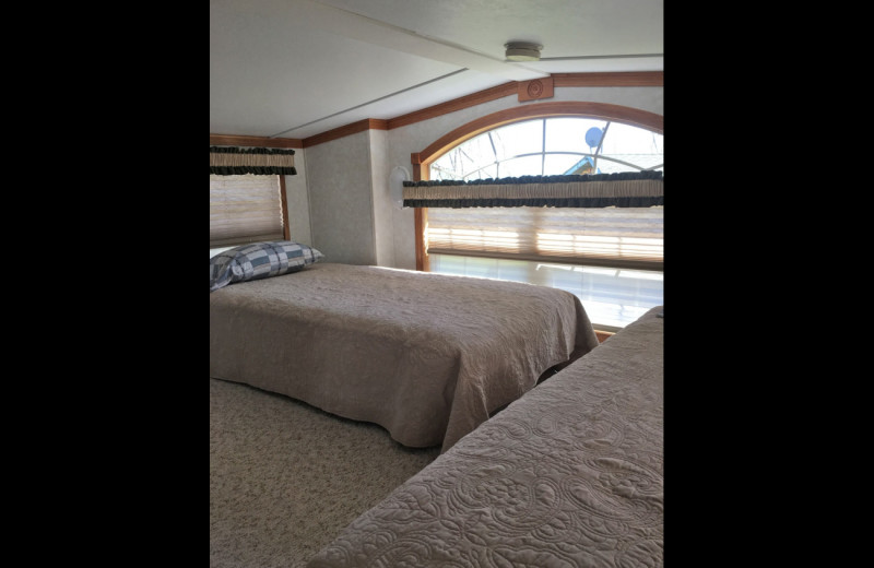 Cabin bedroom at Sullivans Resort & Campground.