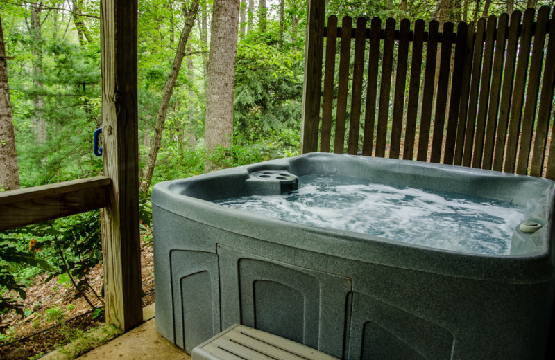 Cabin hot tub at Asheville Cabins of Willow Winds.