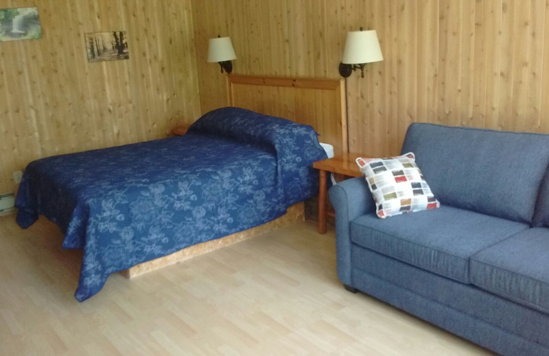 Cabin bedroom at Evergreen Resort.