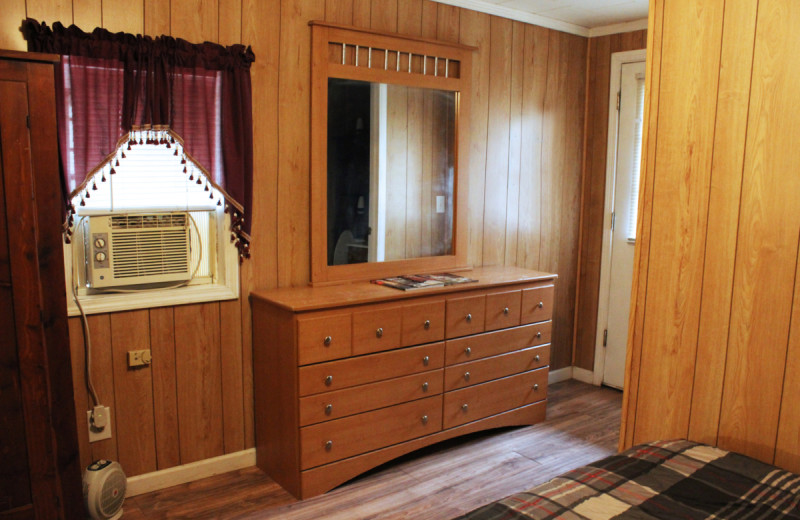 Cabin bedroom at Berry Creek Cabins.