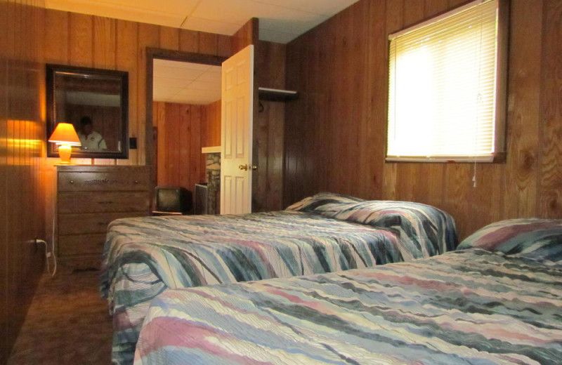 Cabin bedroom at The Depe Dene Resort.