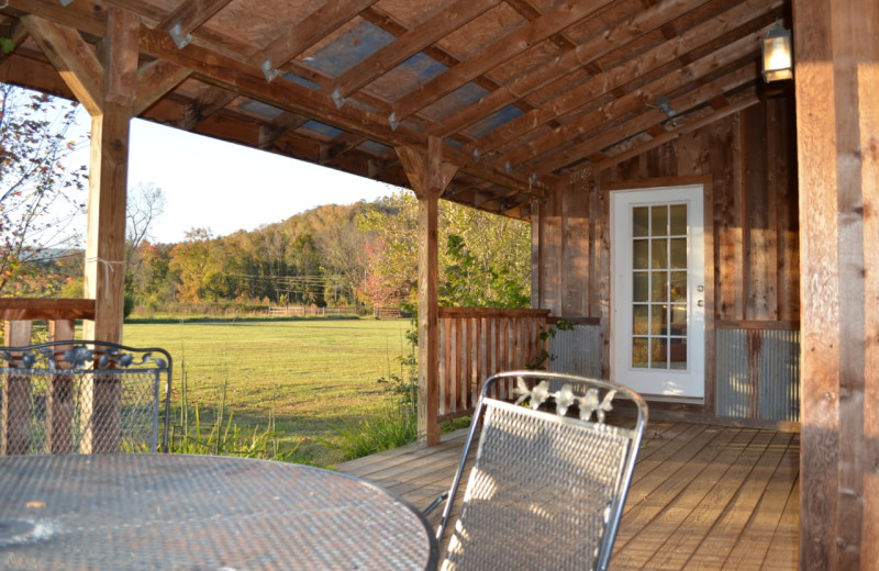 Cabin porch at Mulberry Mountain Lodging & Events.