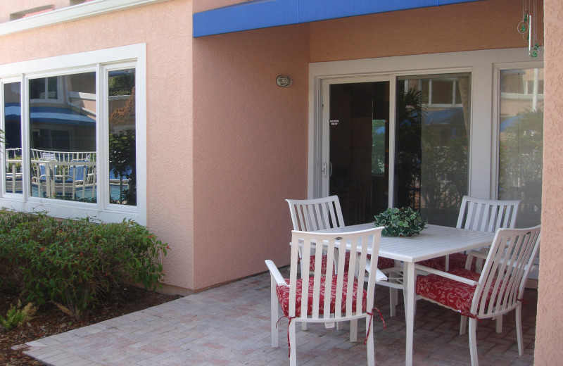 Vacation rental patio at Sand Cay Beach Resort.