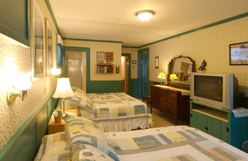 Cabin bedroom at Trout House Village Resort.