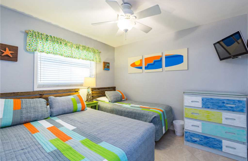 Rental bedroom at Surf Song Resort Condominiums.