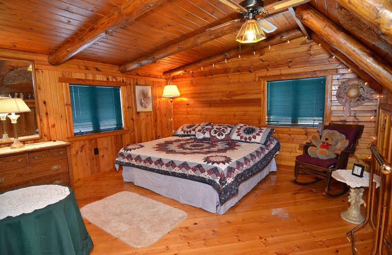 Cabin bedroom at North Country Vacation Rentals.