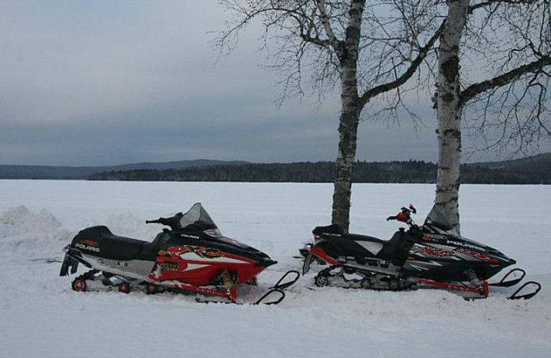 Snowmobiling at Bald Mountain Camps Resort.