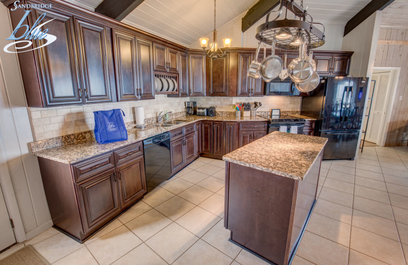 Rental kitchen at Sandbridge Blue Vacation Rentals.