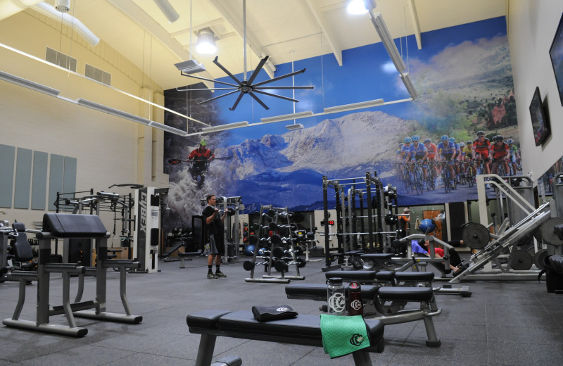 9,000 square foot fitness facility with cardio equipment, free weights, personal trainers, and group fitness classes.