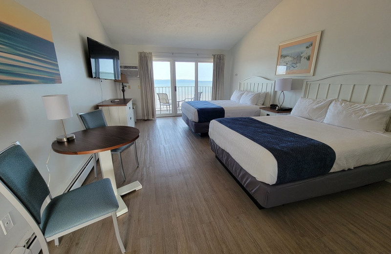 Guest room at Pointes North Beachfront Resort Hotel.