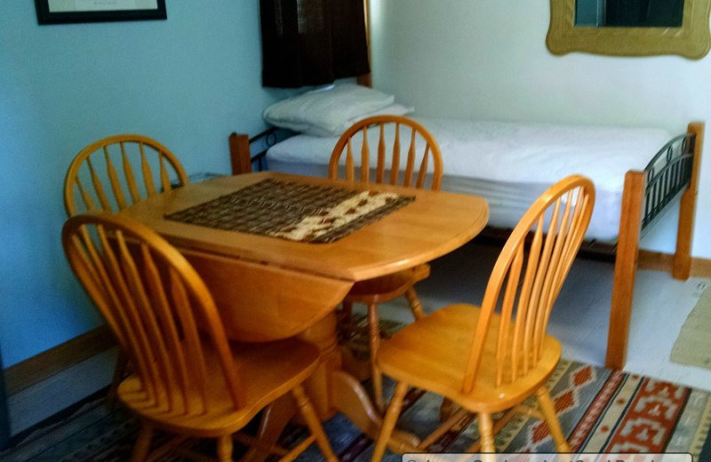 Cabin table and bed at Lost Creek Guest Ranch.