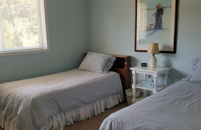 Rental bedroom at Oceanfront Getaways.