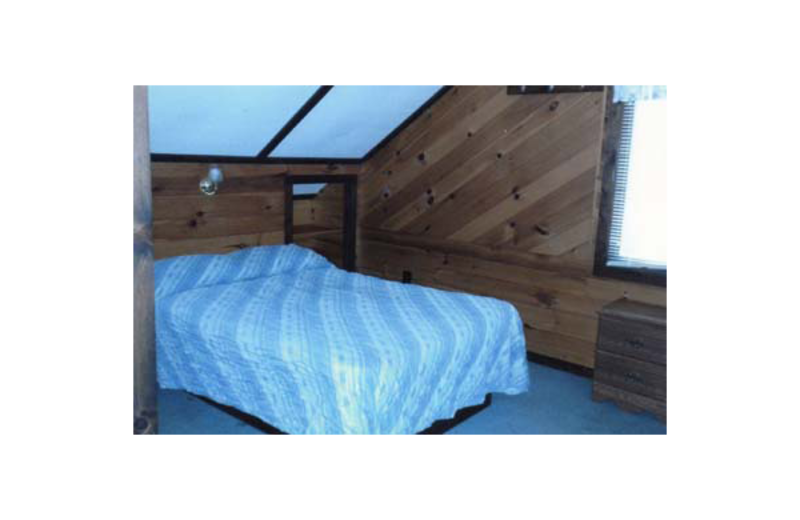 Cabin bedroom at Madsen's Resort.