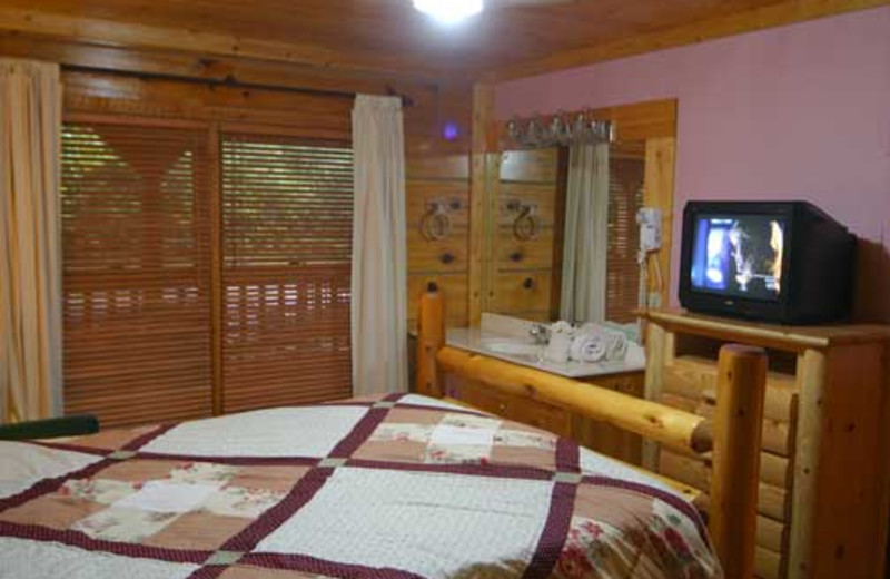 Bedroom at Baskins Creek Cabin Rentals