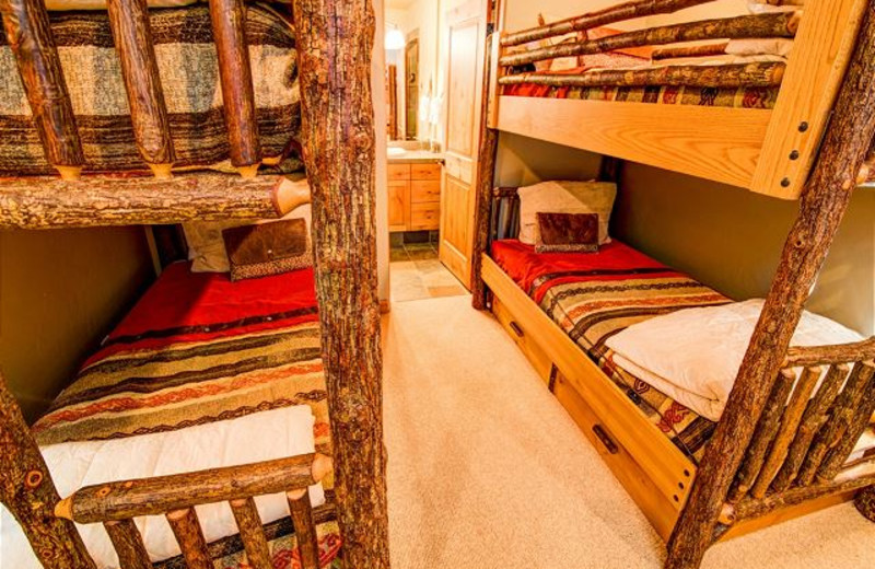 Rental bunk bedroom at Black Diamond Vacation Rentals.