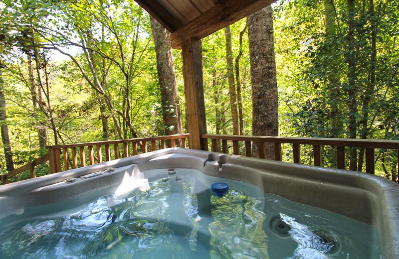 Rental hot tub at Hidden Creek Cabins.