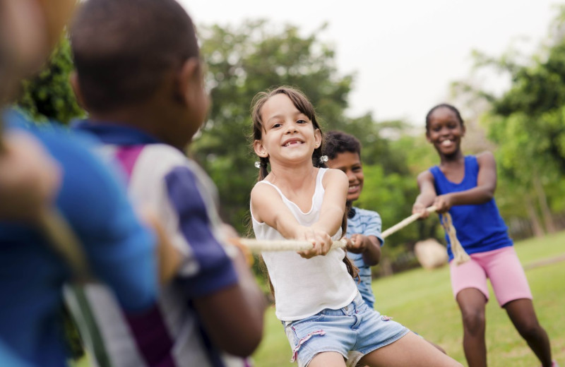 Kids playing tug-o-war at Boar's Head Resort.