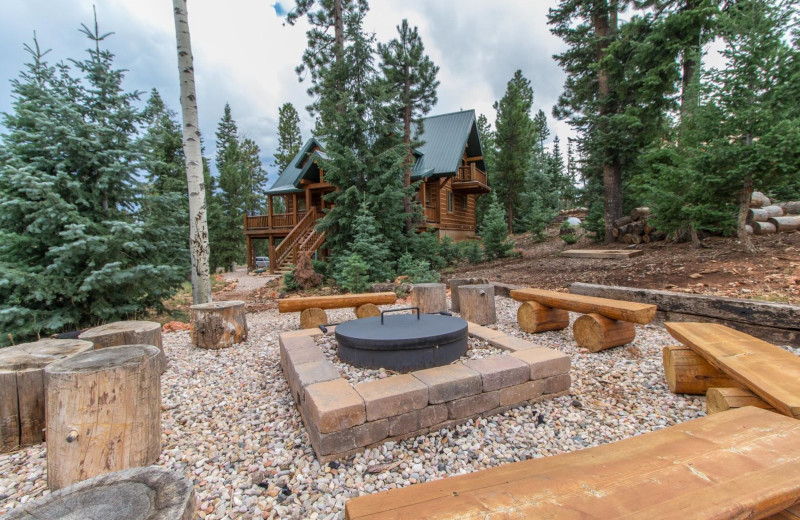 Rental fire pit at Family Time Vacation Rentals.