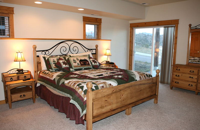 Vacation rental bedroom at Marys Lake Vacation Condos.