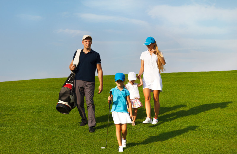 Family golfing at Inn at Eagle Mountain.