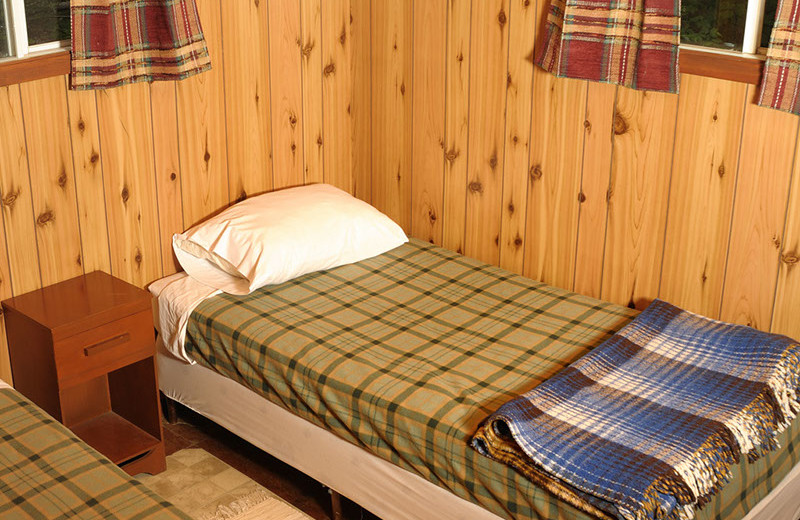 Cabin bedroom at Rough Rock Lodge.