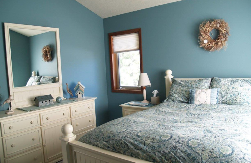 Rental bedroom at Oceanfront Getaways.