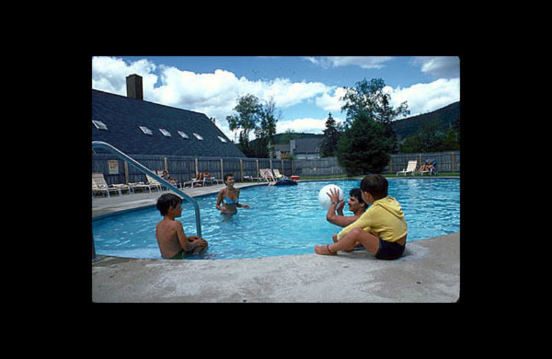 Family swimming at Village Condominium.