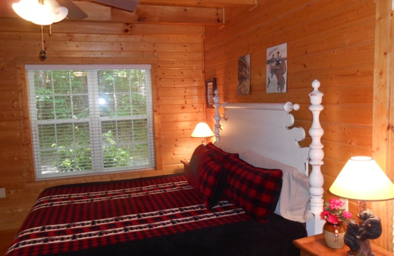 Cabin bedroom at Cabins at Highland Falls.