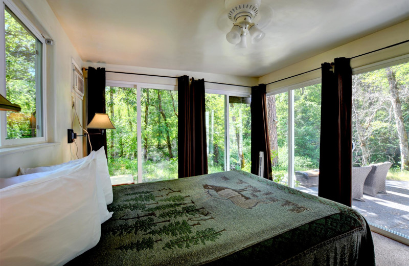 Cabin bedroom at Morrison's Rogue River Lodge.