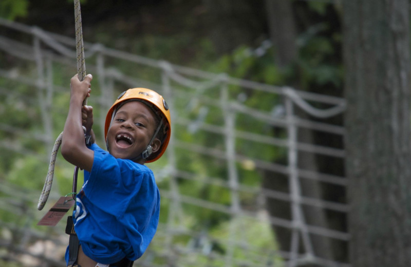 Child on zip line at Massanutten Resort.