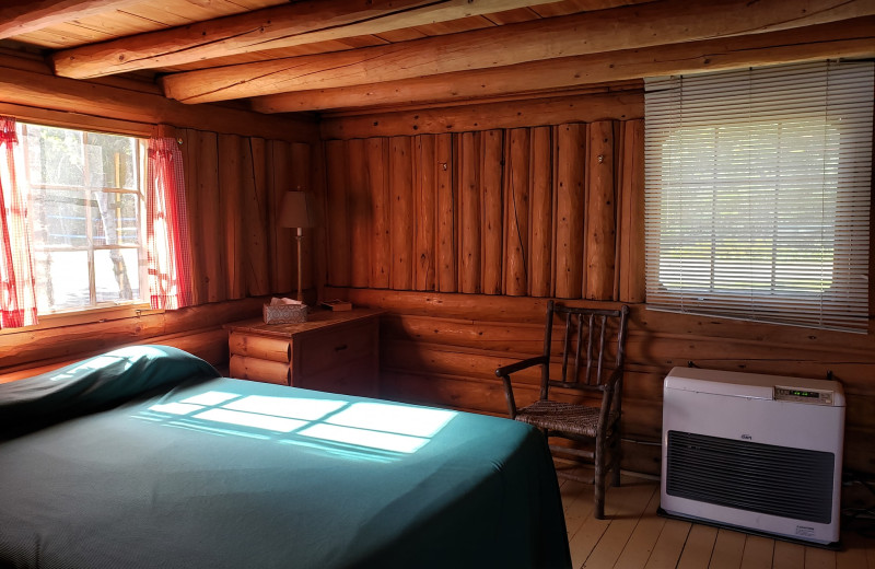 Cabin bedroom at The Birches Resort.