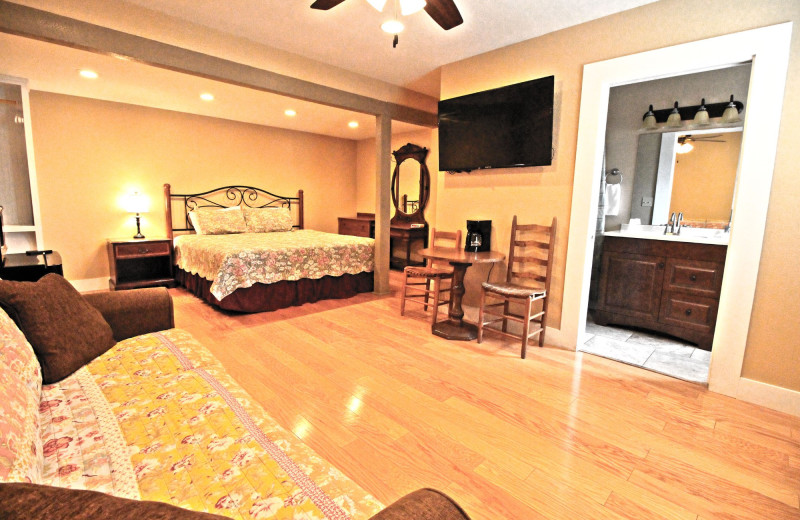 Guest room at Peach Tree Inn & Suites.