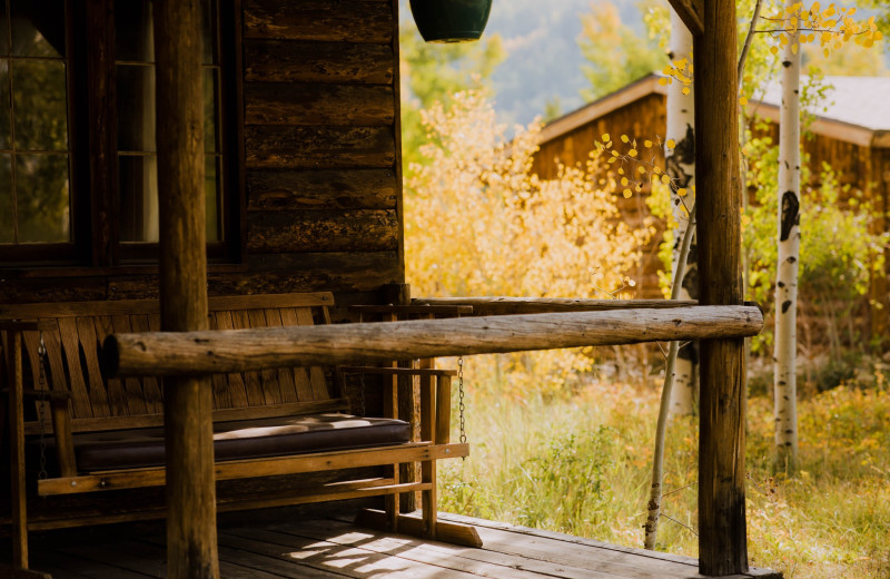 Cabin porch at Rawah Guest Ranch.