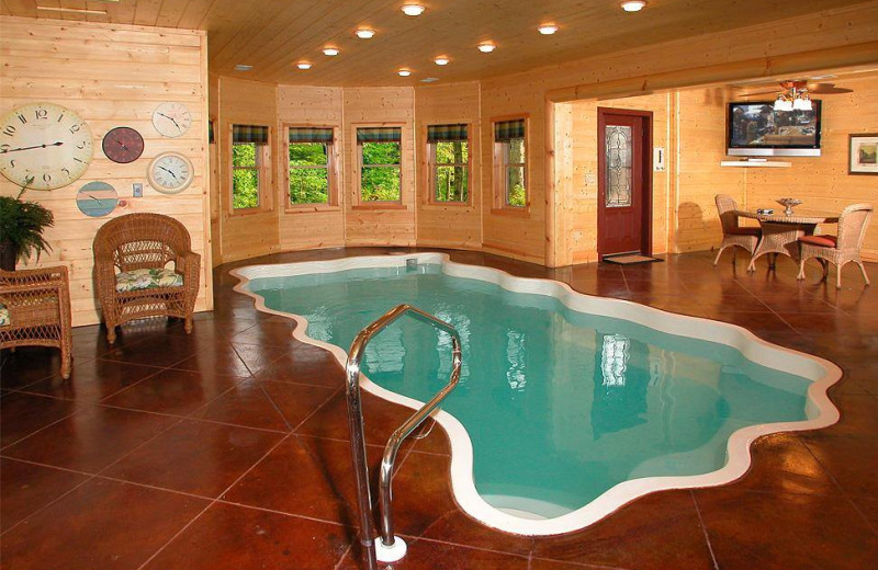 Cabin indoor pool at Timber Tops Luxury Cabin Rentals.