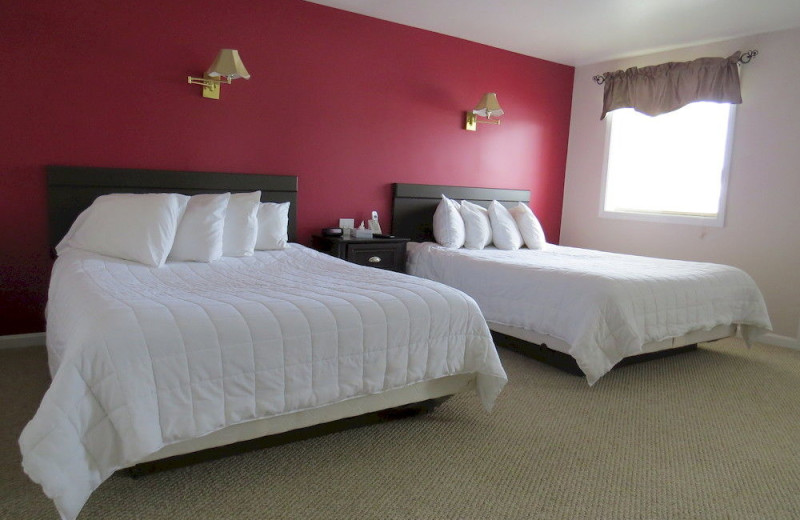 Guest room at Misty Harbor & Barefoot Beach Resort.