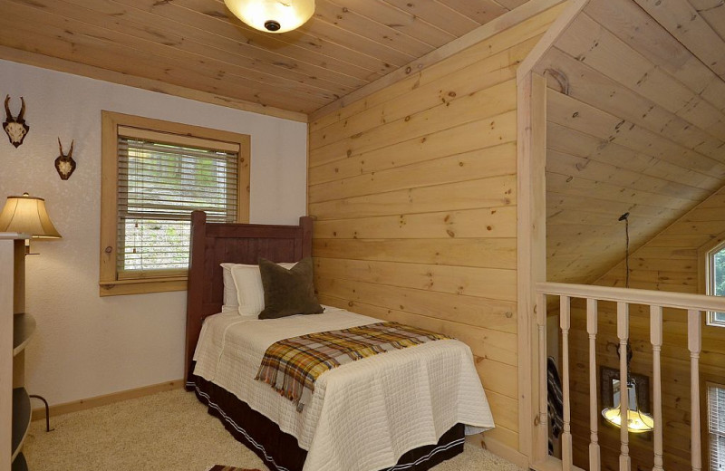 Rental bedroom at Premier Vacation Rentals.