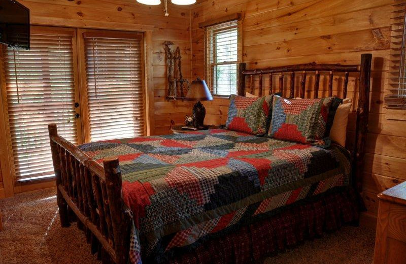 Cabin bedroom at Southern Comfort Cabin Rentals.