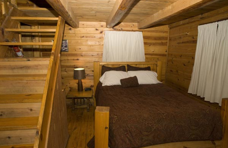 Cabin bedroom at Buffalo River Outfitters.