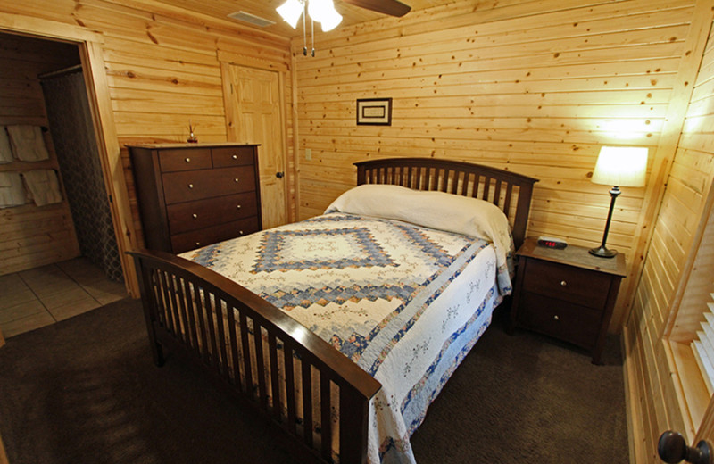 Cabin bedroom at Cut Above Cabins.