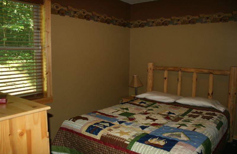 Cabin bedroom at Ten Mile Lake Resort -Otter Tail Country Lakes Tourism.