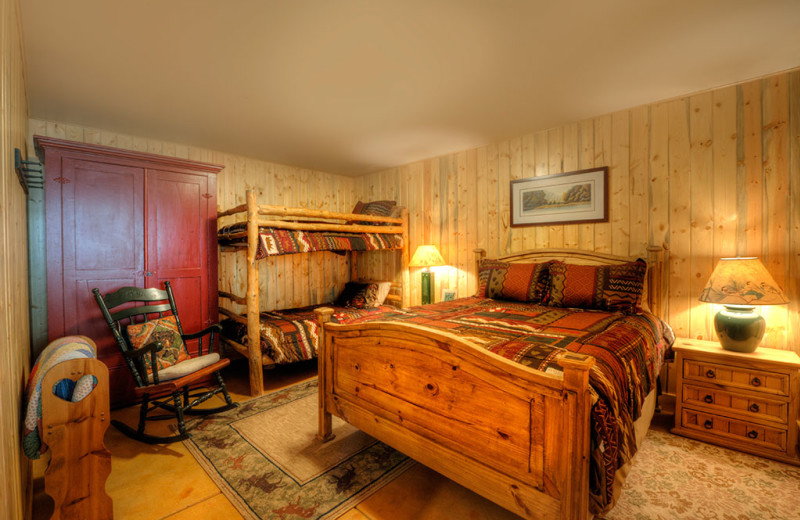 Cabin bedroom at Wild Skies Cabin Rentals.