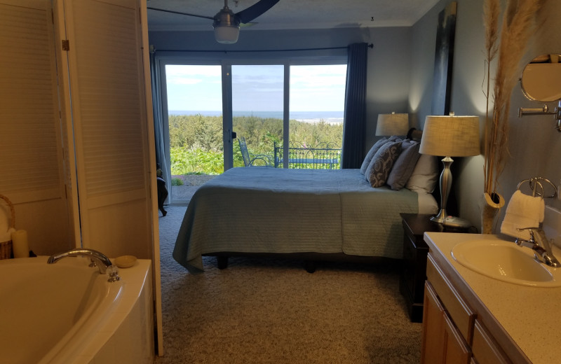 Rental bedroom at Oceanfront Getaways.