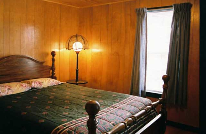 Cabin bedroom at Wilsons On Moosehead Lake.