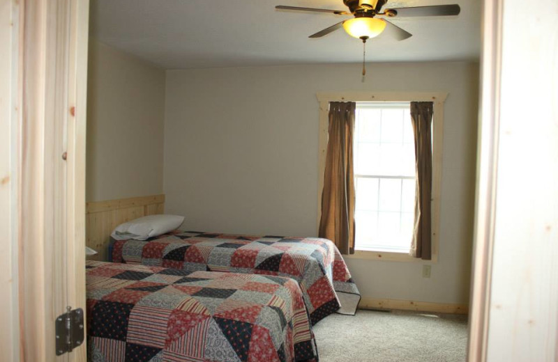 Cottage bedroom at Bonnie Beach Resort.