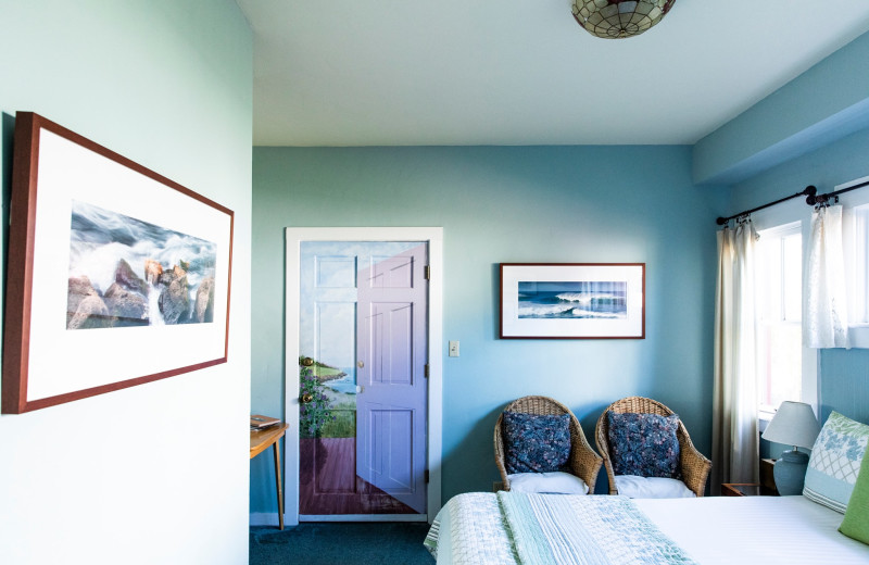 Cottage bedroom at Alegria Oceanfront Inn & Cottages.