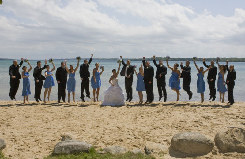 Wedding on the beach at A-Ga-Ming Golf Resort.